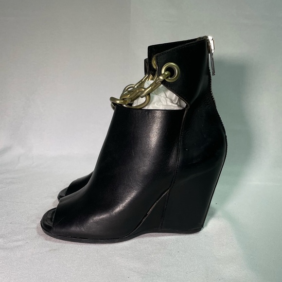Rick Owens Shoes - RICK OWENS Chain-trimmed leather wedge ankle boots.